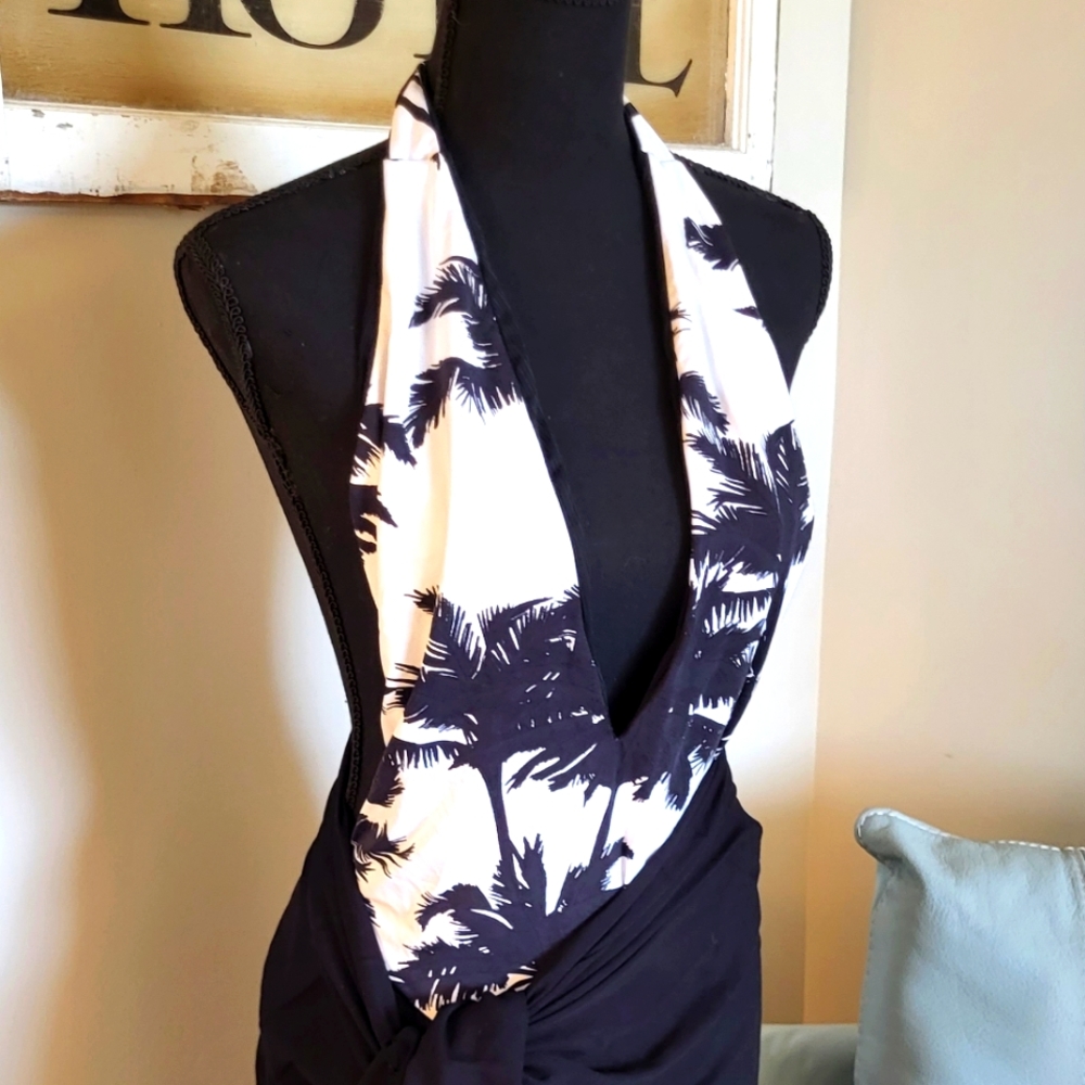 Reversible Swimsuit, 1 Piece sz. MED/LG. Black /White
